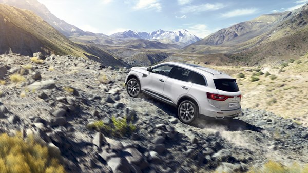 Renault Koleos climbing on a rocky hill