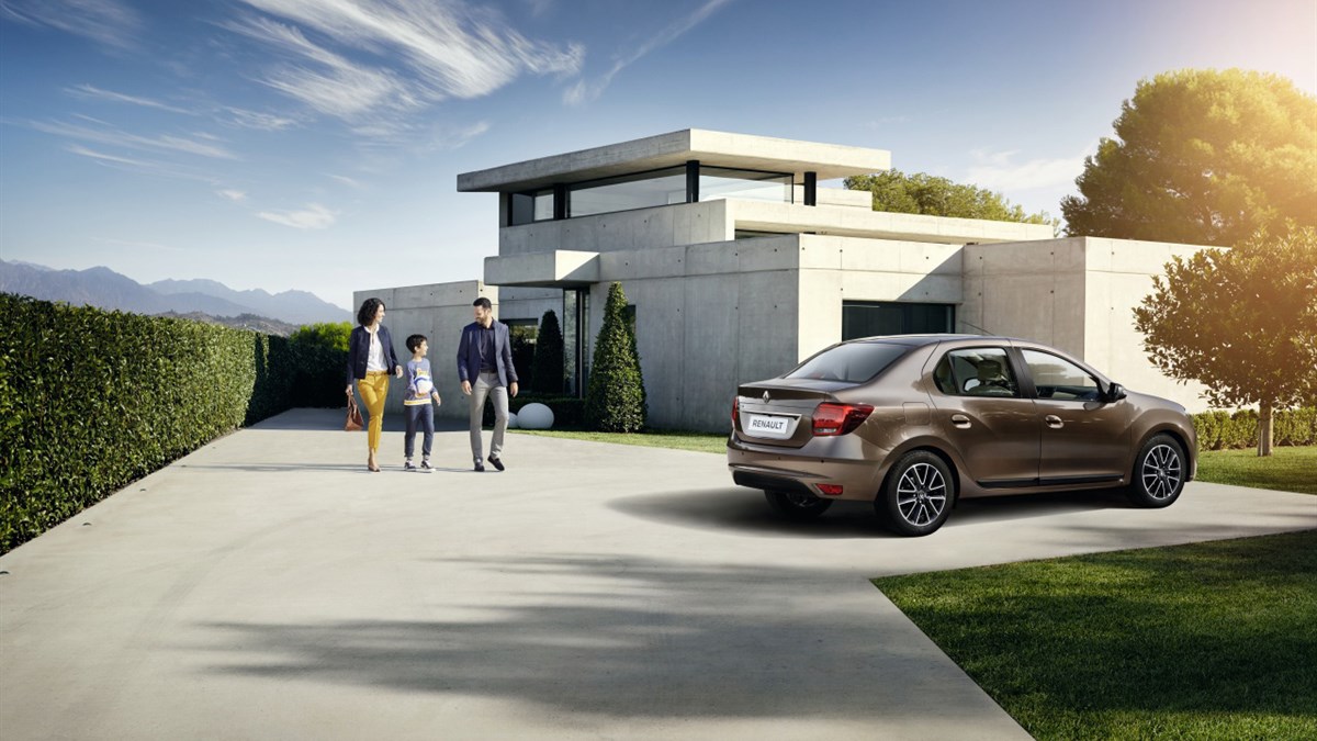 A family walking towards Renault Logan 