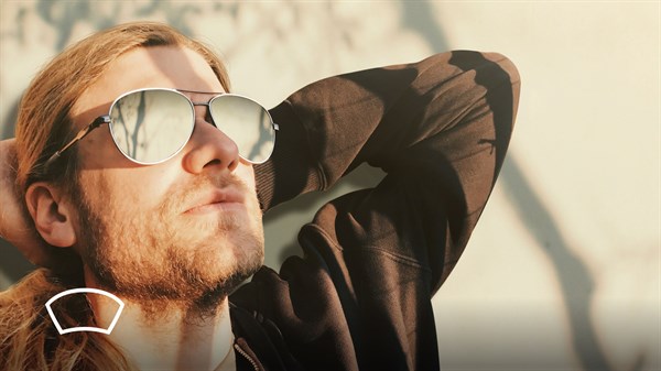 A relaxed man looking upwards